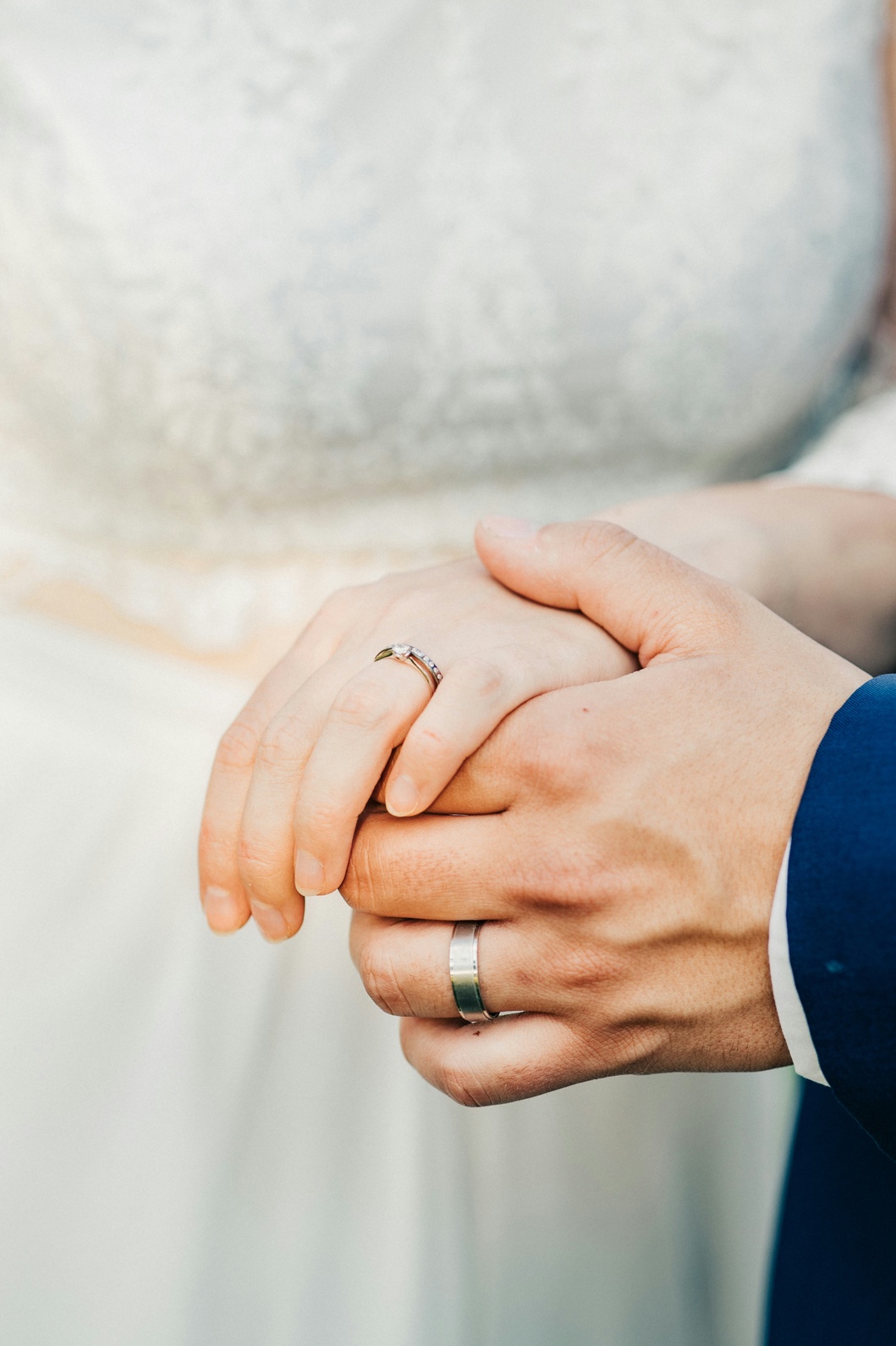 Holding hands showing rings