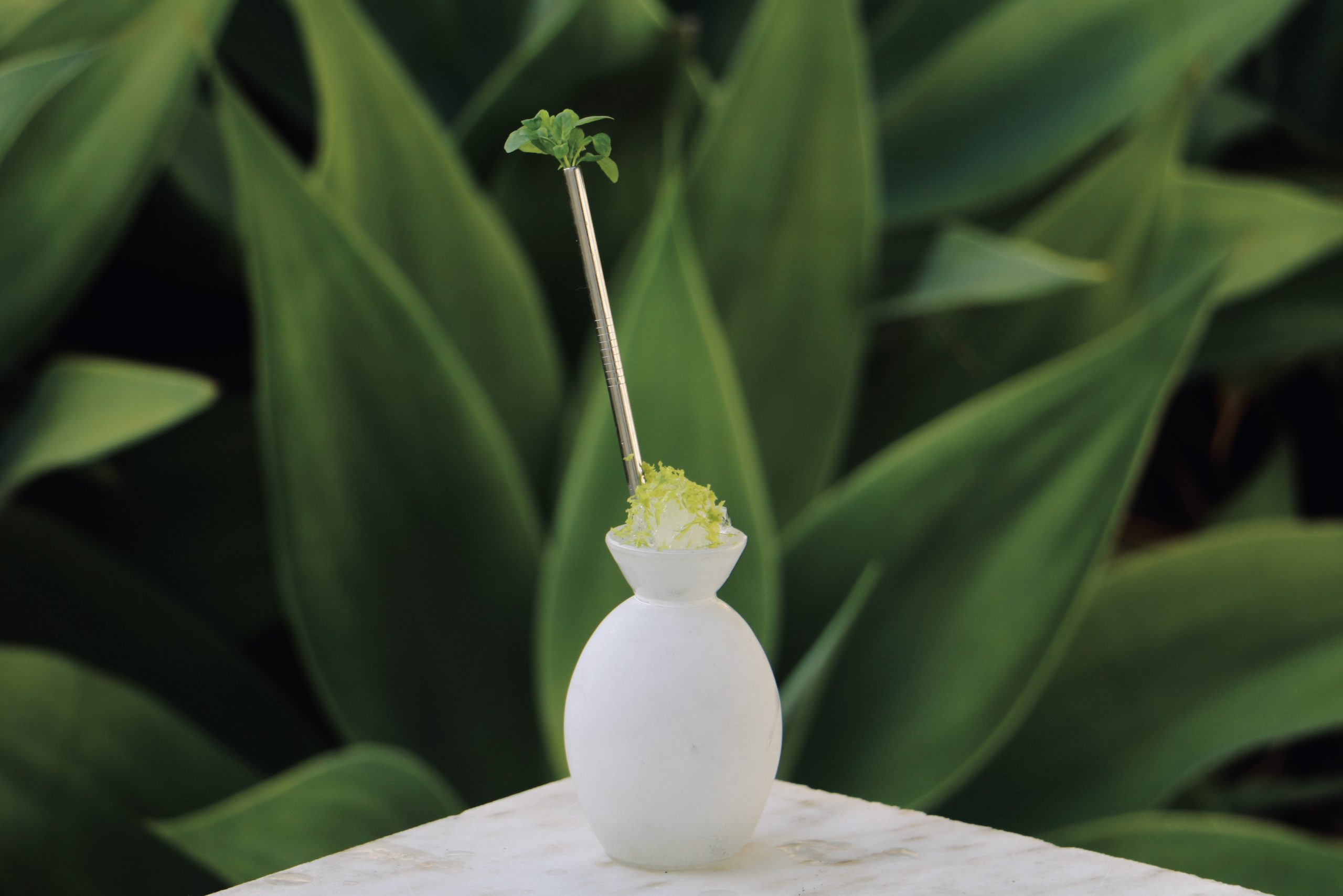 Cocktail with green background