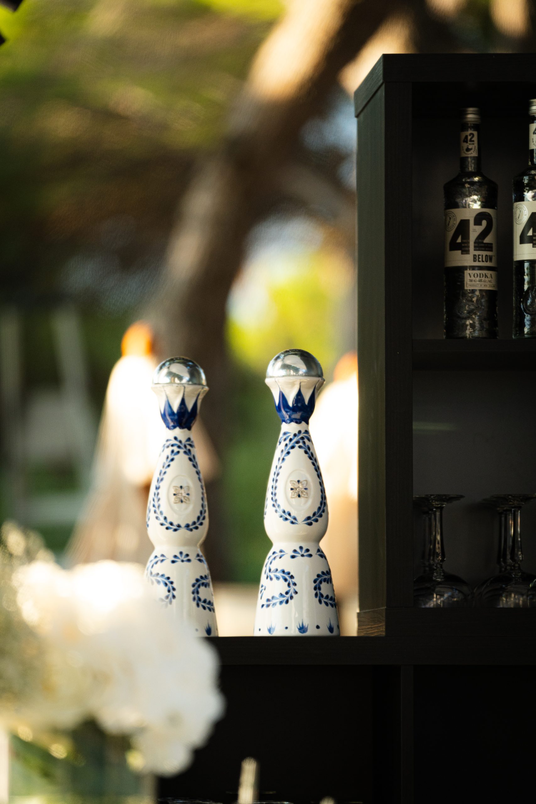 close up of cocktail bottles on bar