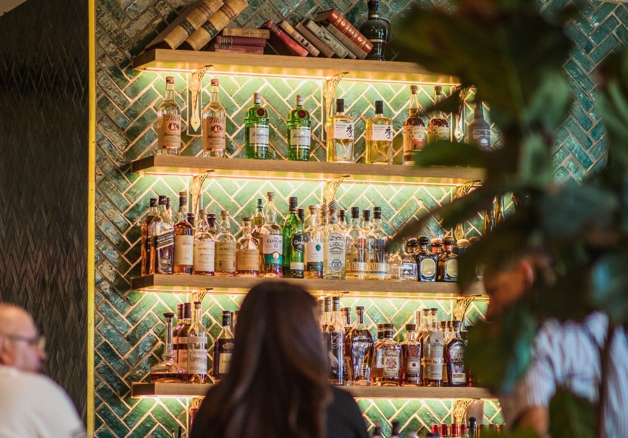 Drink being displayed behind a bar